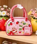 Bolsa bowling rosa Strawberry Shortcake con bordados de fresas y flores