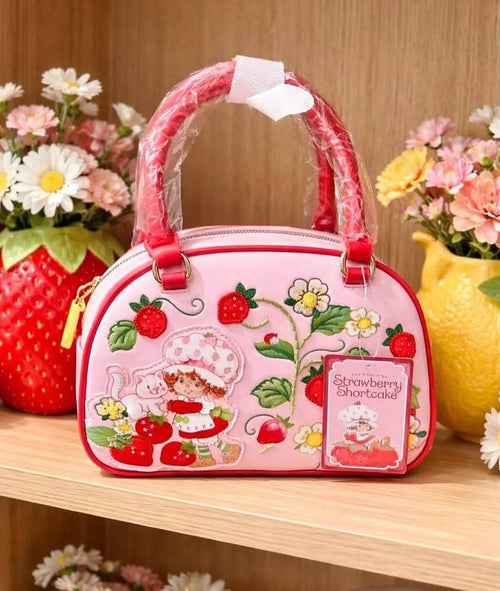 Bolsa bowling rosa Strawberry Shortcake con bordados de fresas y flores